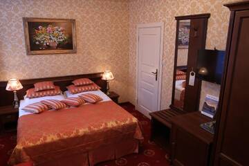Фото номера Двухместный номер Делюкс с 1 кроватью Отель Hotel Kopernik г. Цехоцинек 5
