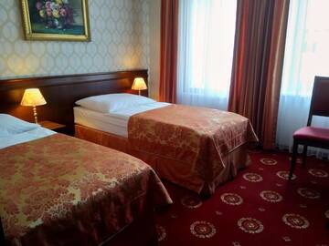 Фото номера Просторный двухместный номер с 2 отдельными кроватями Отель Hotel Kopernik г. Цехоцинек 2
